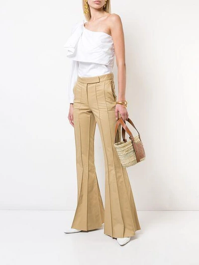 Shop Rosie Assoulin Vertical Stitching Bootcut Trousers - Brown