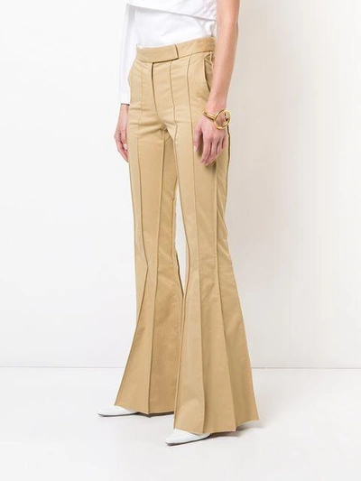 Shop Rosie Assoulin Vertical Stitching Bootcut Trousers - Brown