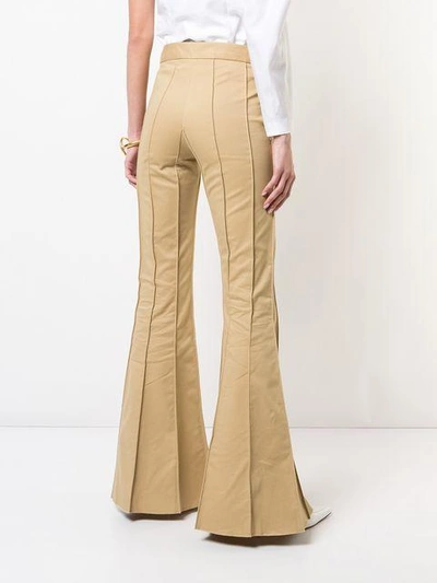 Shop Rosie Assoulin Vertical Stitching Bootcut Trousers - Brown