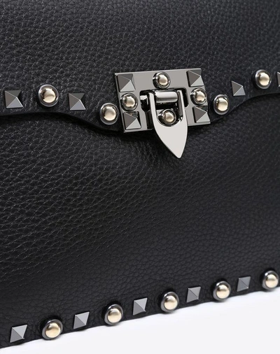 Shop Valentino Guitar Strap Crossbody Bag In Black