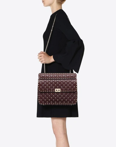 Shop Valentino Garavani Large Rockstud Spike Nappa Leather Bag In Ruby