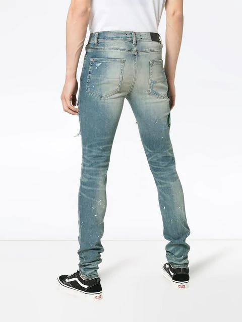 Amiri Thrasher Skinny-fit Appliquéd Distressed Stretch-denim Jeans In ...