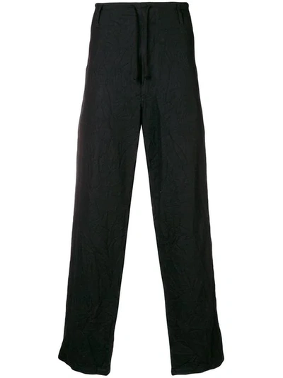 Shop Yohji Yamamoto "wrinkled" Relaxed Trousers - Black