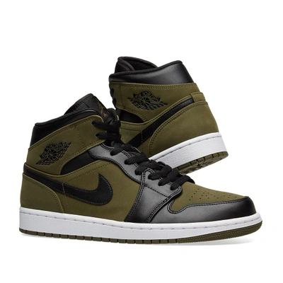 Shop Nike Air Jordan 1 Mid In Green