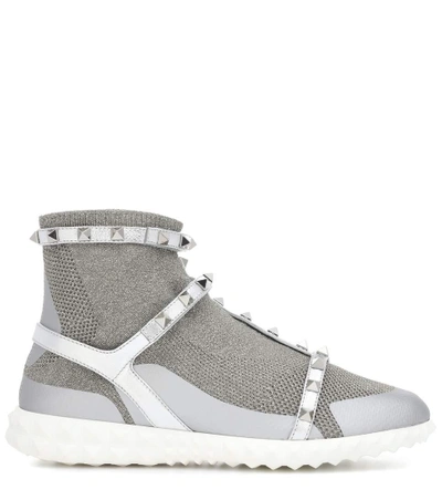 Shop Valentino Rockstud Metallic Sneakers In Silver