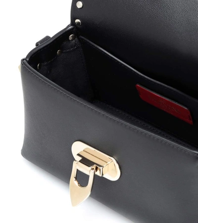 Shop Valentino Rockstud Leather Shoulder Bag In Black