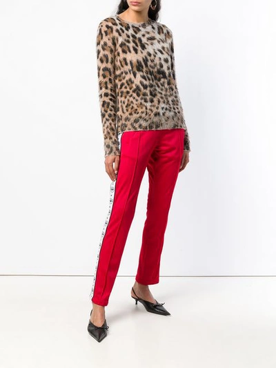 Shop Chiara Ferragni Eye-motif Straight Track Trousers In Red