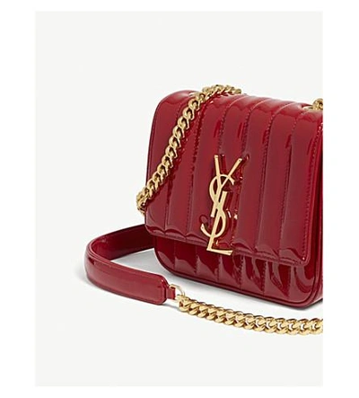 Shop Saint Laurent Monogram Vicky Small Patent Leather Cross-body Bag In Red