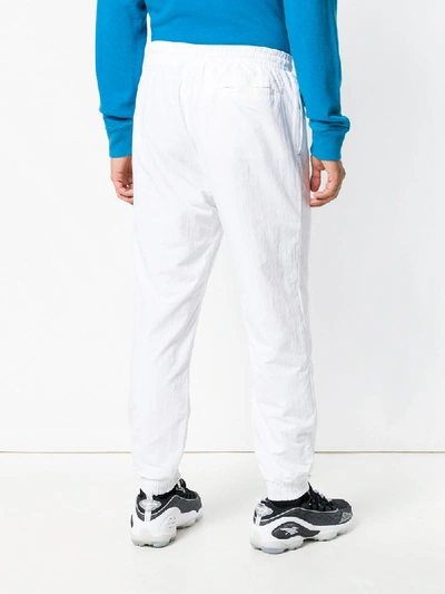 Shop Reebok Track Pants - White