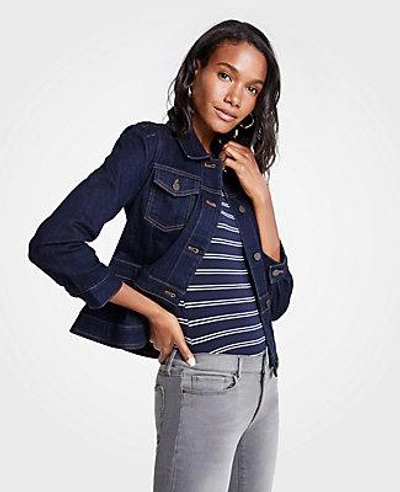 Shop Ann Taylor Petite Peplum Denim Jacket In Evening Sea Wash