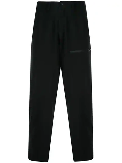 Shop Yohji Yamamoto Zip Pocket Tapered Trousers In Black