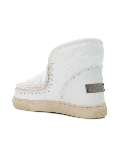 whipstitched ankle boots