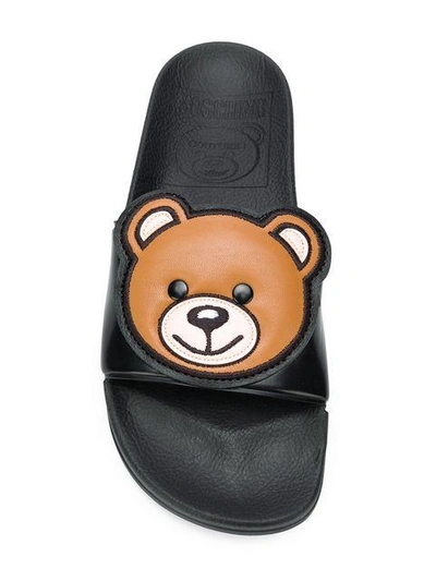 Shop Moschino Teddy Bear Slides In Black