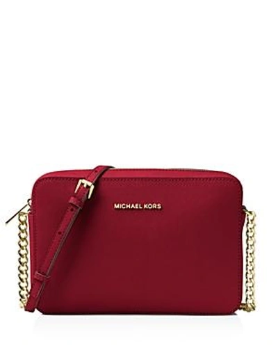 Shop Michael Michael Kors Jet Set Large Saffiano Leather Crossbody In Maroon/gold