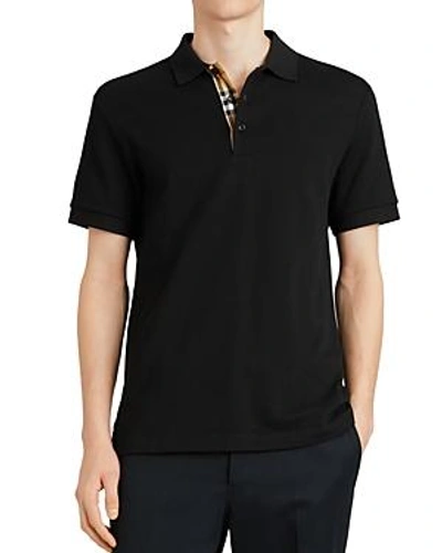 Shop Burberry Hartford Regular Fit Polo Shirt In Black