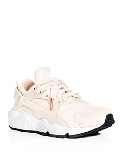 Shop Nike Women's Air Huarache Run Se Lace Up Sneakers In Guava Ice/black White