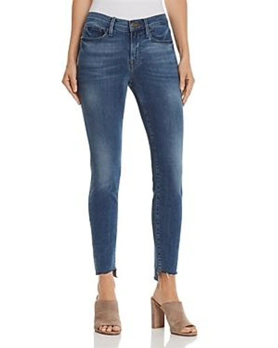 Shop Frame Le Skinny De Jeanne Reverse Cascade Step-hem Jeans In Cape May