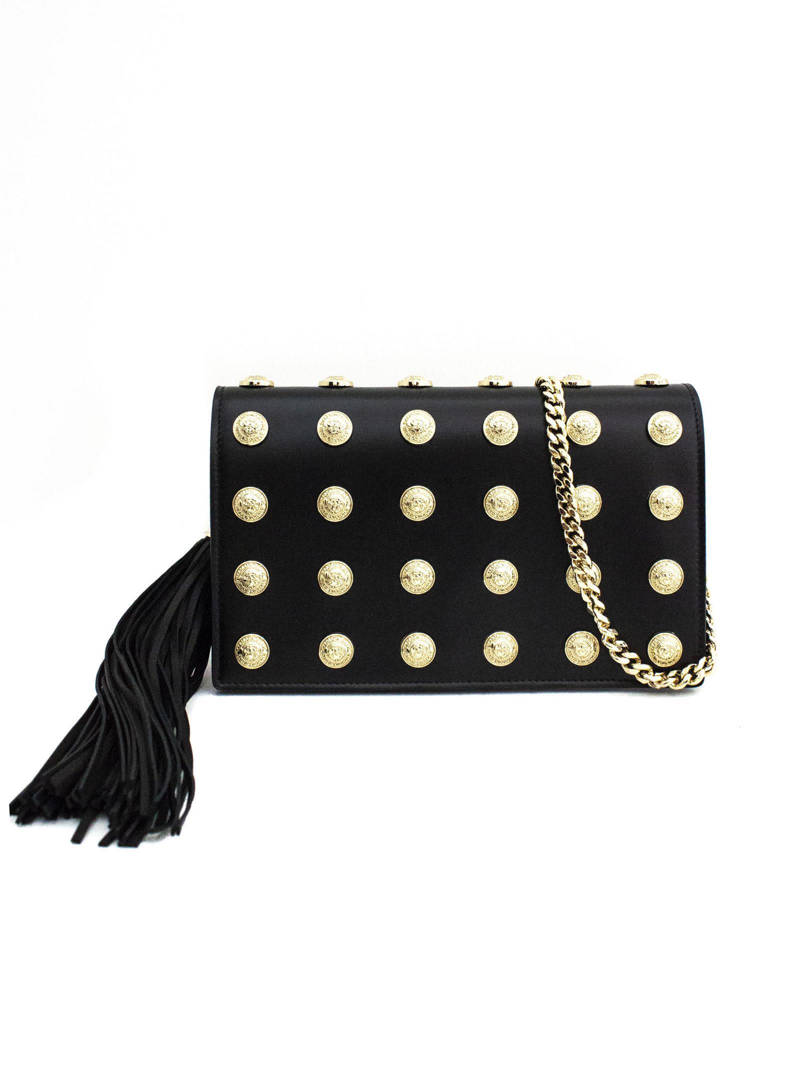 gold studded clutch