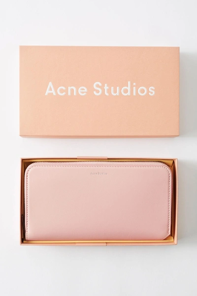 Shop Acne Studios Continental Wallet Powder Pink