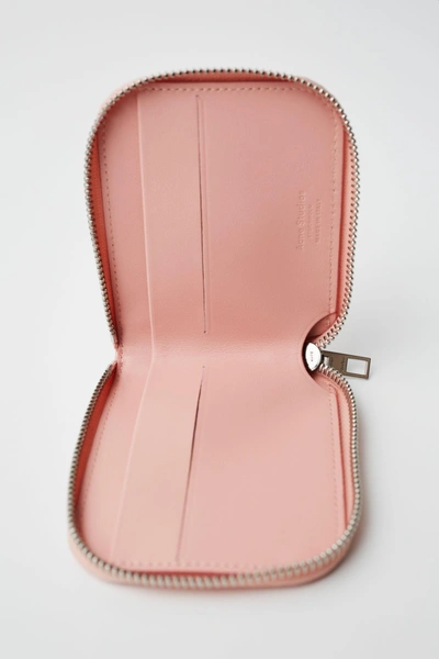 Shop Acne Studios Compact Wallet Powder Pink