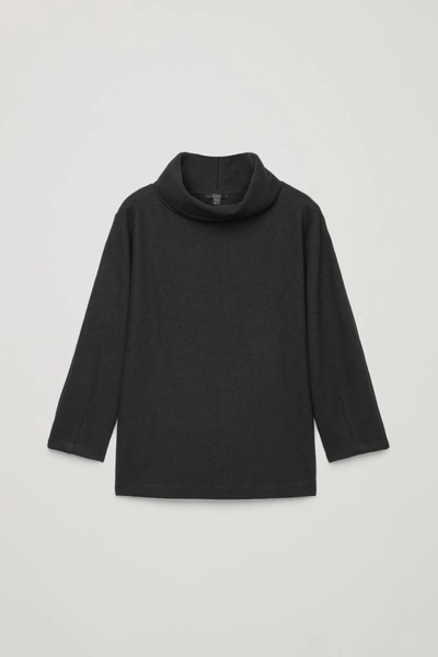 Shop Cos Wool Top With Cocoon Sleeves In Black