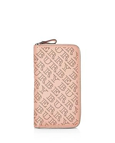 Shop Burberry Medium Perforated Leather Zip Around Wallet In Pale Fawn Pink/silver
