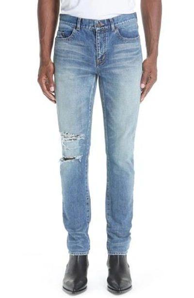 Shop Saint Laurent Destroyed Light Skinny Fit Jeans In 4512 Blue