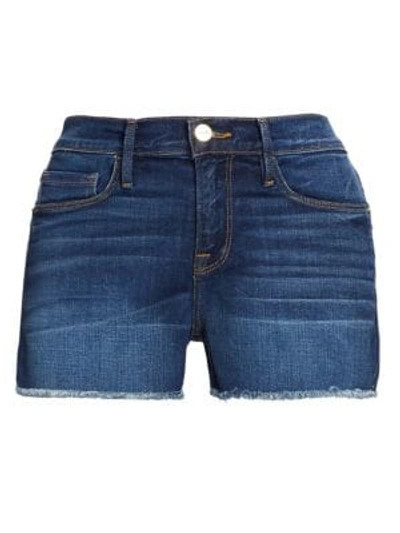 Shop Frame Le Cut Off Mid-rise Fitted Raw Hem Denim Shorts In Williams
