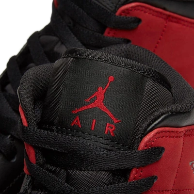 Shop Nike Air Jordan 1 Mid In Red