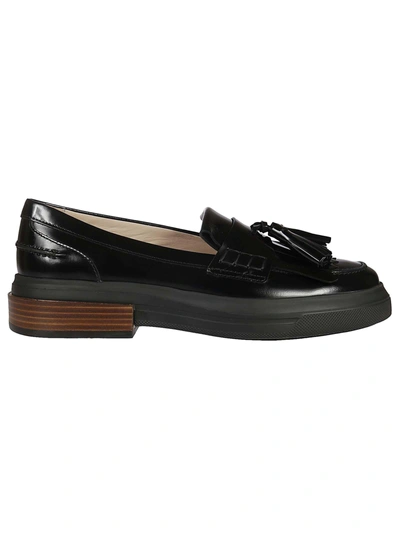 Shop Tod's Tassel Detailed Loafers In Black