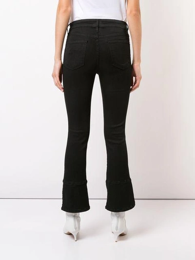 Shop Frame Le Crop Mini Boot Jeans In Black