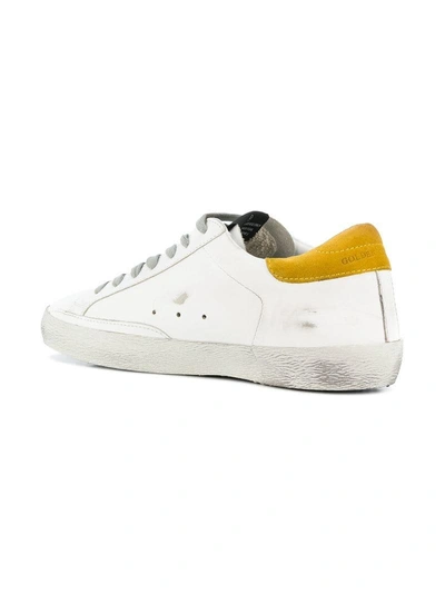 Shop Golden Goose Deluxe Brand Superstar Distressed Sneakers - White