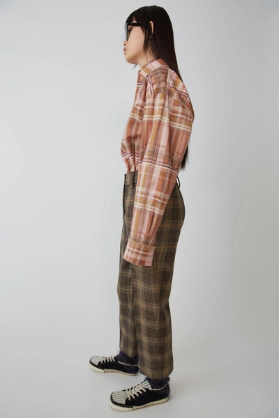 Shop Acne Studios Tapered Trousers Brown/beige