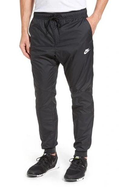 Nike Men's Sportswear Windrunner Jogger Pants, Black | ModeSens