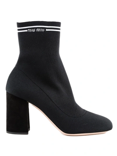 Shop Miu Miu Knit Logo Boots In Nero+bianco