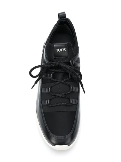 Shop Tod's Low Top Trainers In Black