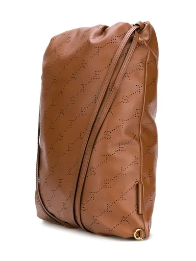 Shop Stella Mccartney Logo Perforated Drawstring Backpack In Brown