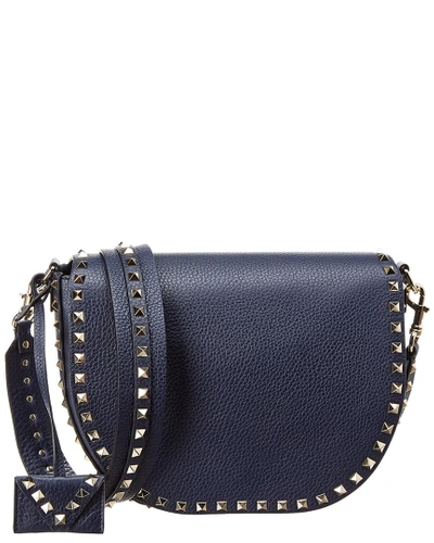 Shop Valentino Rockstud Leather Saddle Bag In Blue