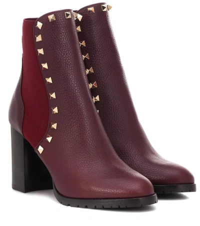 Shop Valentino Rockstud Leather Ankle Boots In Red