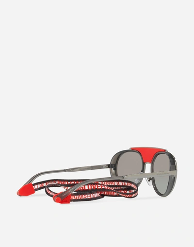 Shop Dolce & Gabbana Madison Sunglasses In Black And Red
