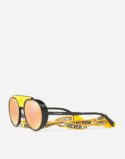Shop Dolce & Gabbana Madison Sunglasses In Black And Yellow