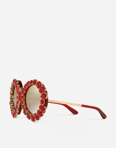 Shop Dolce & Gabbana Round Sunglasses With Colorful Crystals In Red Transparent