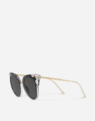 Shop Dolce & Gabbana Bell Sunglasses In Black And Transparent
