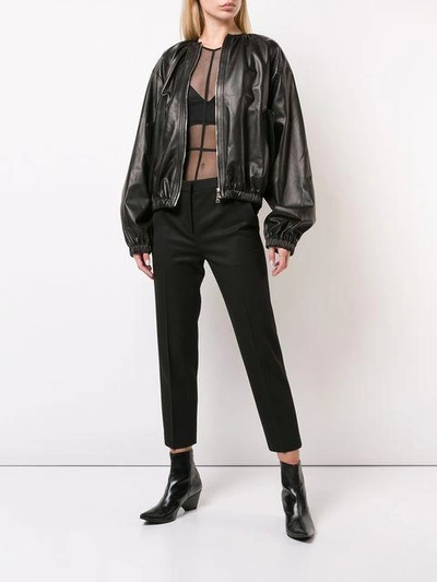 Shop Ann Demeulemeester Longsleeved Sheer Bodysuit - Black