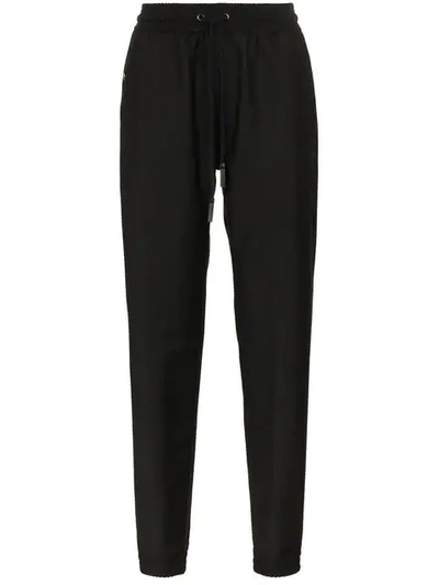 Shop Givenchy Tapered Trousers In Black