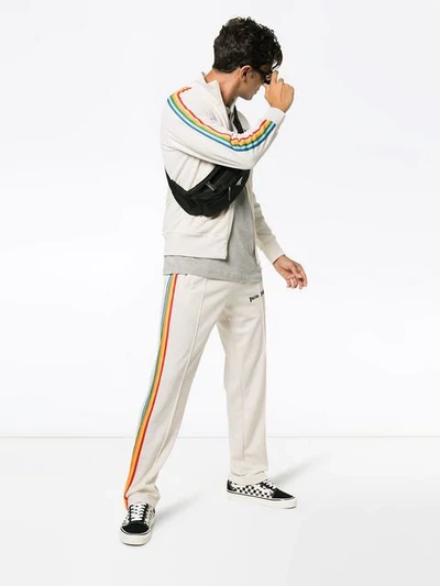 Shop Palm Angels Logo Printed Side Stripe Track Trousers In White