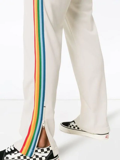 Shop Palm Angels Logo Printed Side Stripe Track Trousers In White