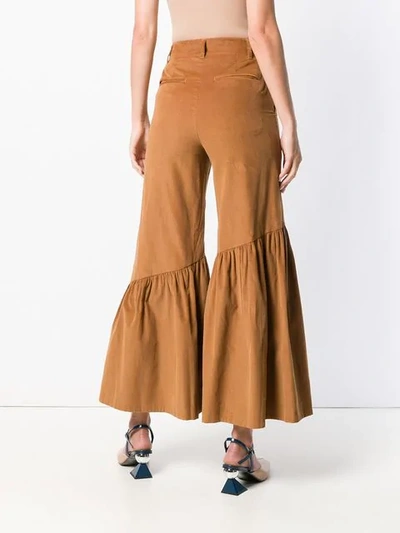 Shop Neul Ruffled Hem Trousers In Brown