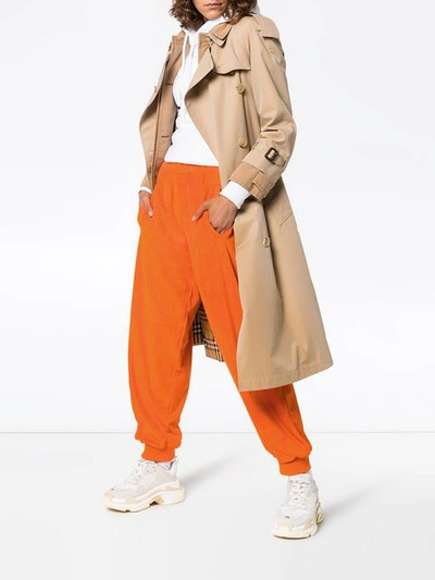 Shop Burberry Logo Tracksuit Bottoms In Yellow & Orange