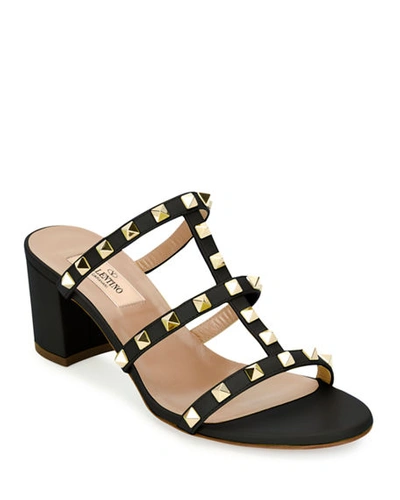 Shop Valentino Rockstud Caged 60mm Slide Sandals In Black